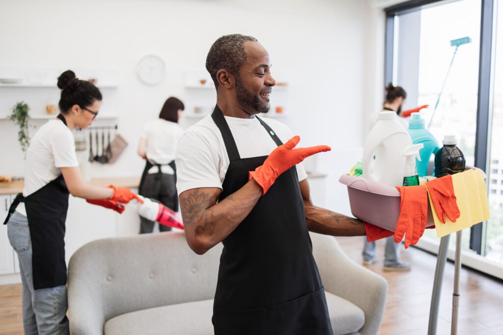 american man professional cleaning worker pointing 2024 12 13 13 59 20 utc